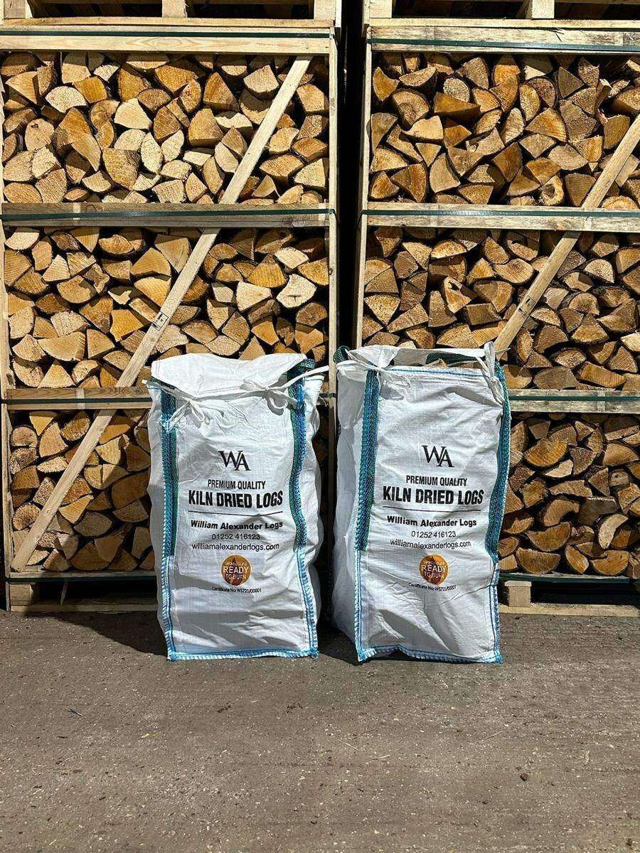 Barrow bags of kiln-dried firewood ready for delivery at the William Alexander yard